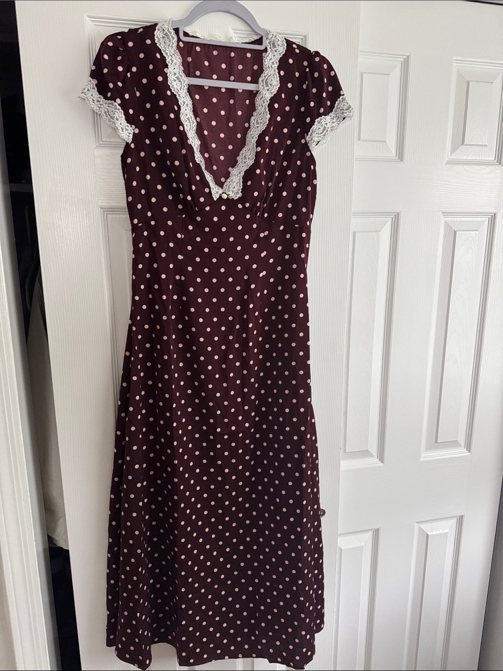 Vintage-Inspired Burgundy Polka Dot Dress with Lace Trim